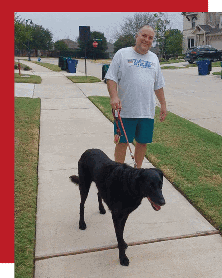 Erick Walking a dog in McKinney during dog walking visit